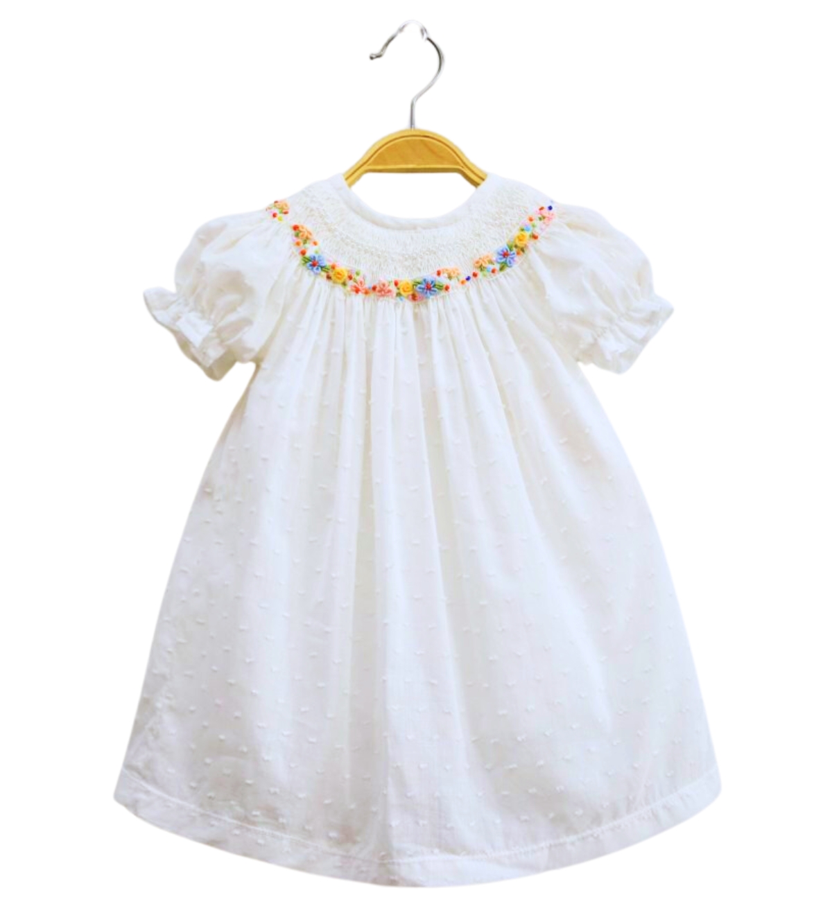 White Dress Embroidered With Small Flowers Around The Neck