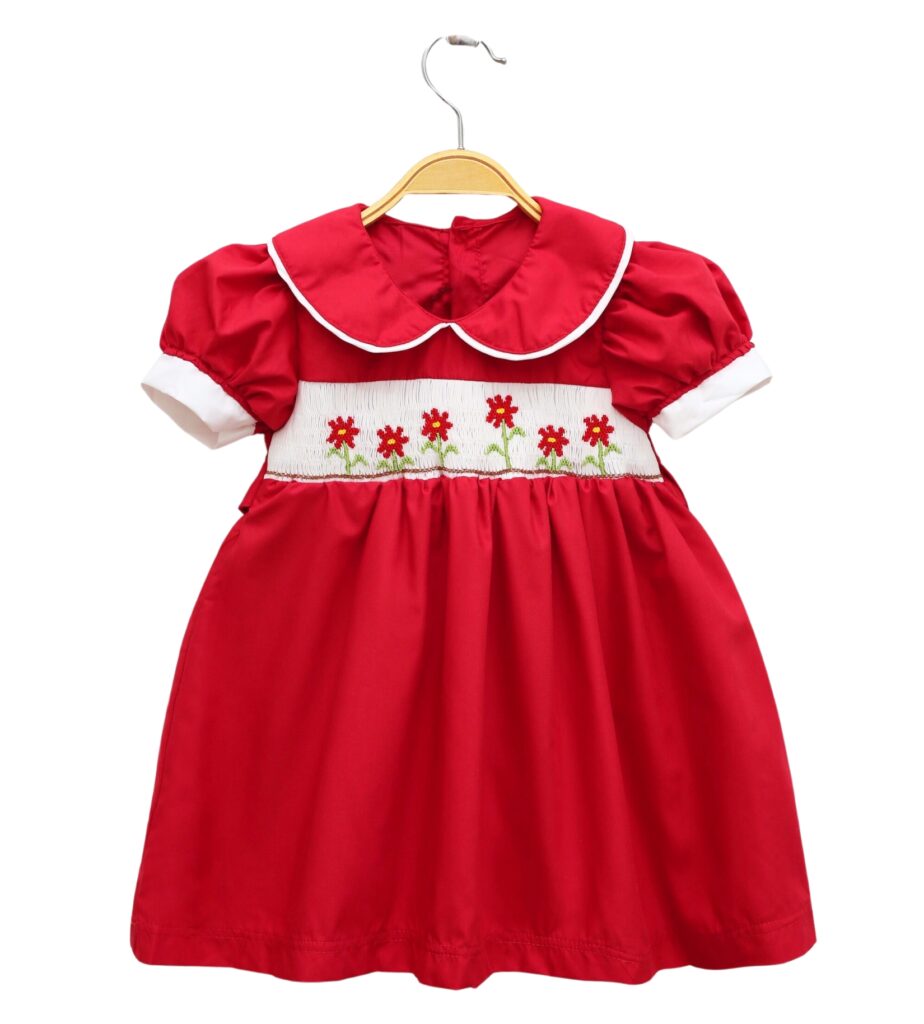 Baby Girl's Red Smocking Dress With Flower Motifs On Tet Holiday