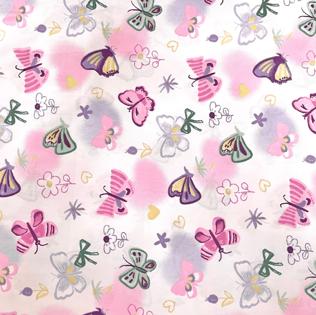 F10 - White fabric with pink butterfly motifs