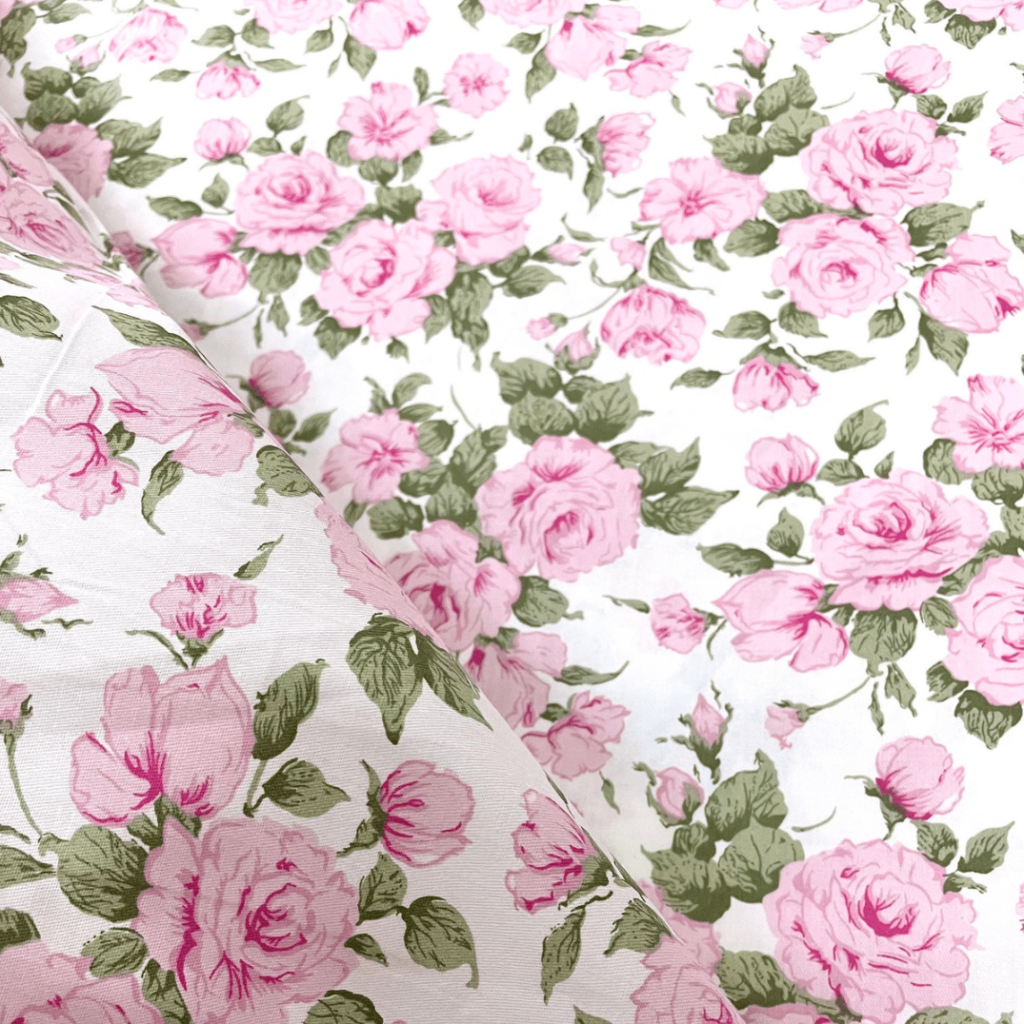 F14 - White fabric with brilliant roses