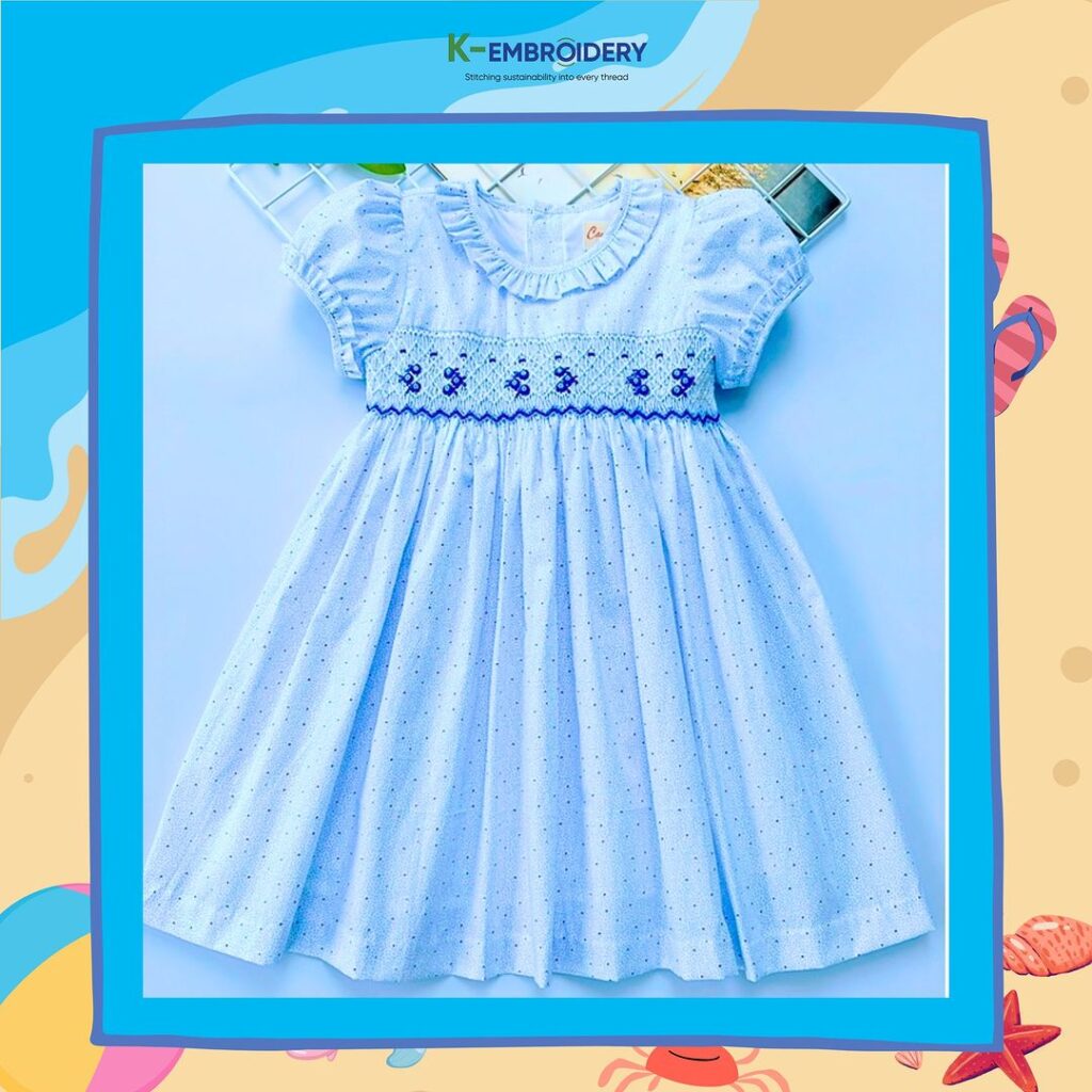 Blue smocked dress with fish motifs