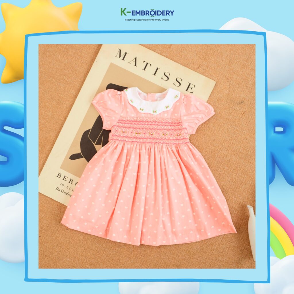 Pink-orange smocked dress with heart dots