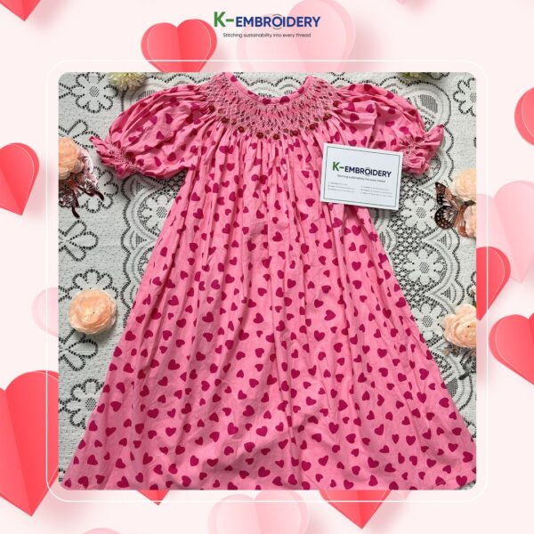 smocked dress with heart motifs
