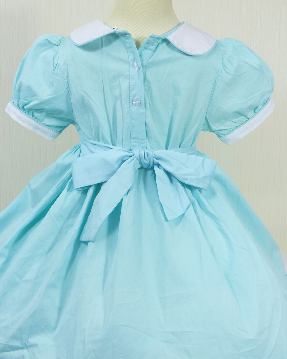 Jade color geometric smocked dress