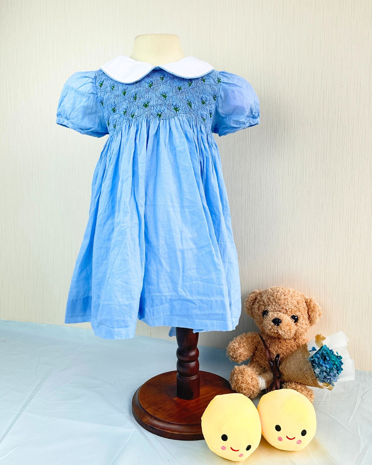 Blue flower hand embroidered smocked dress