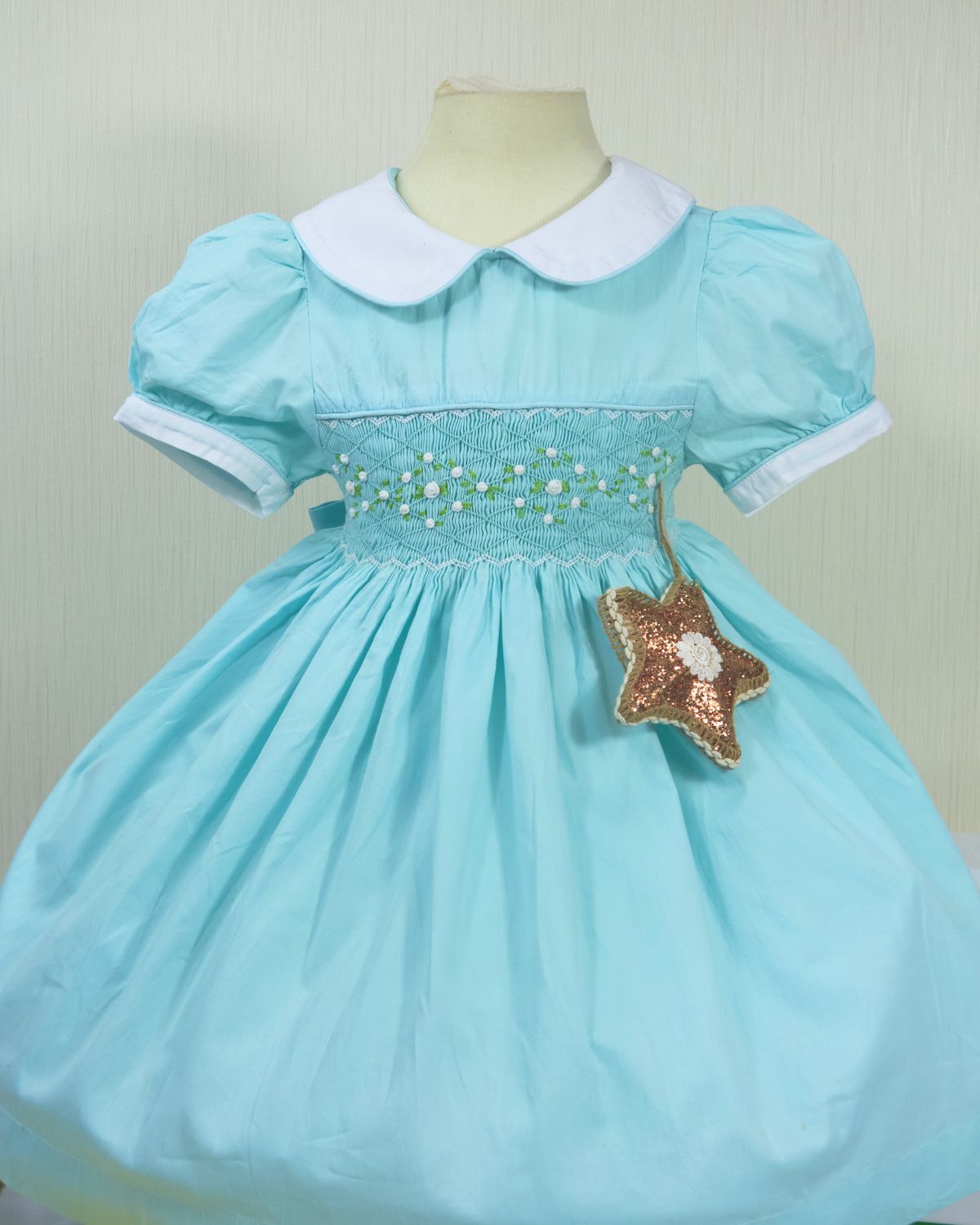 Jade color geometric smocked dress