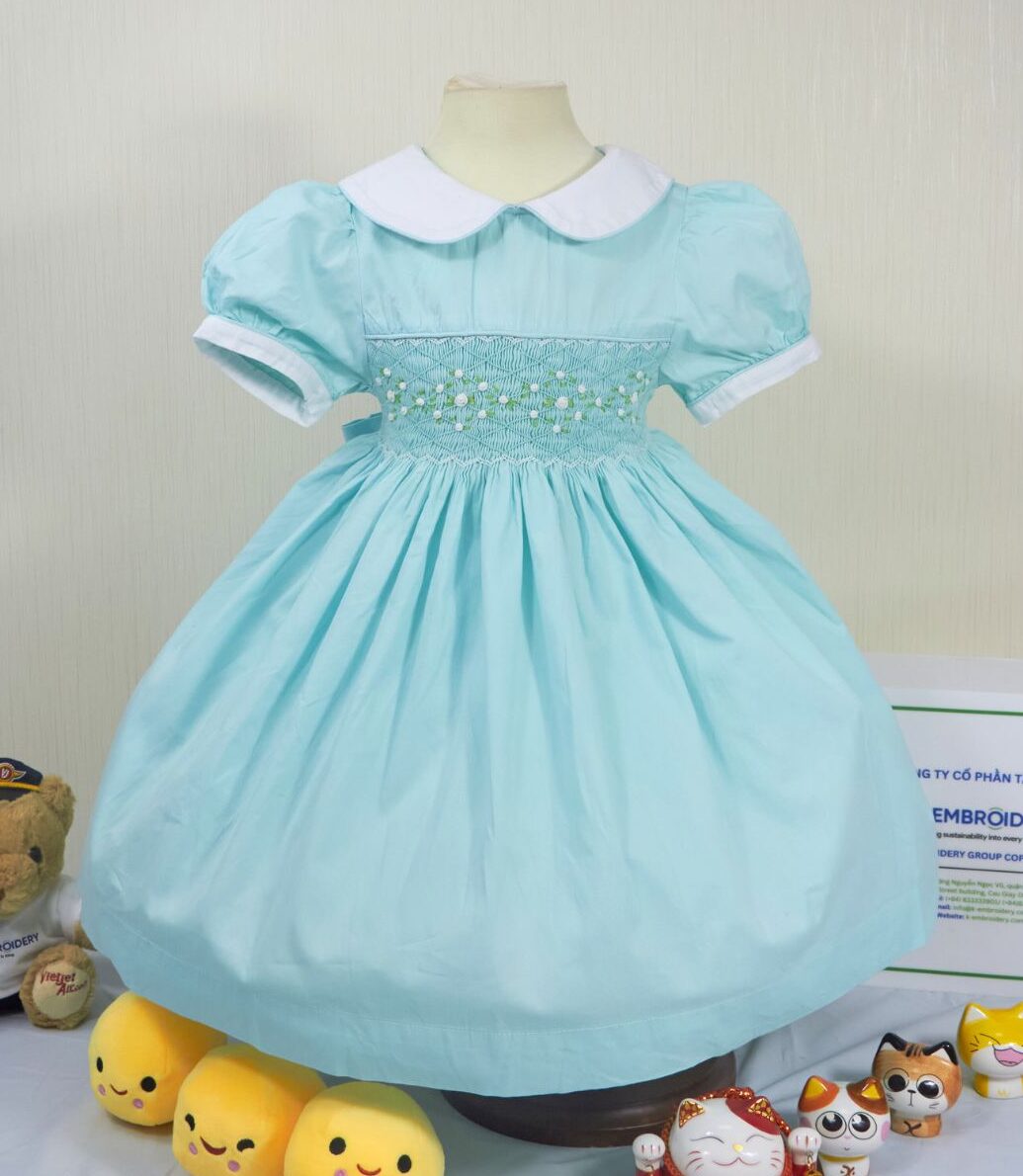 Jade color geometric smocked dress