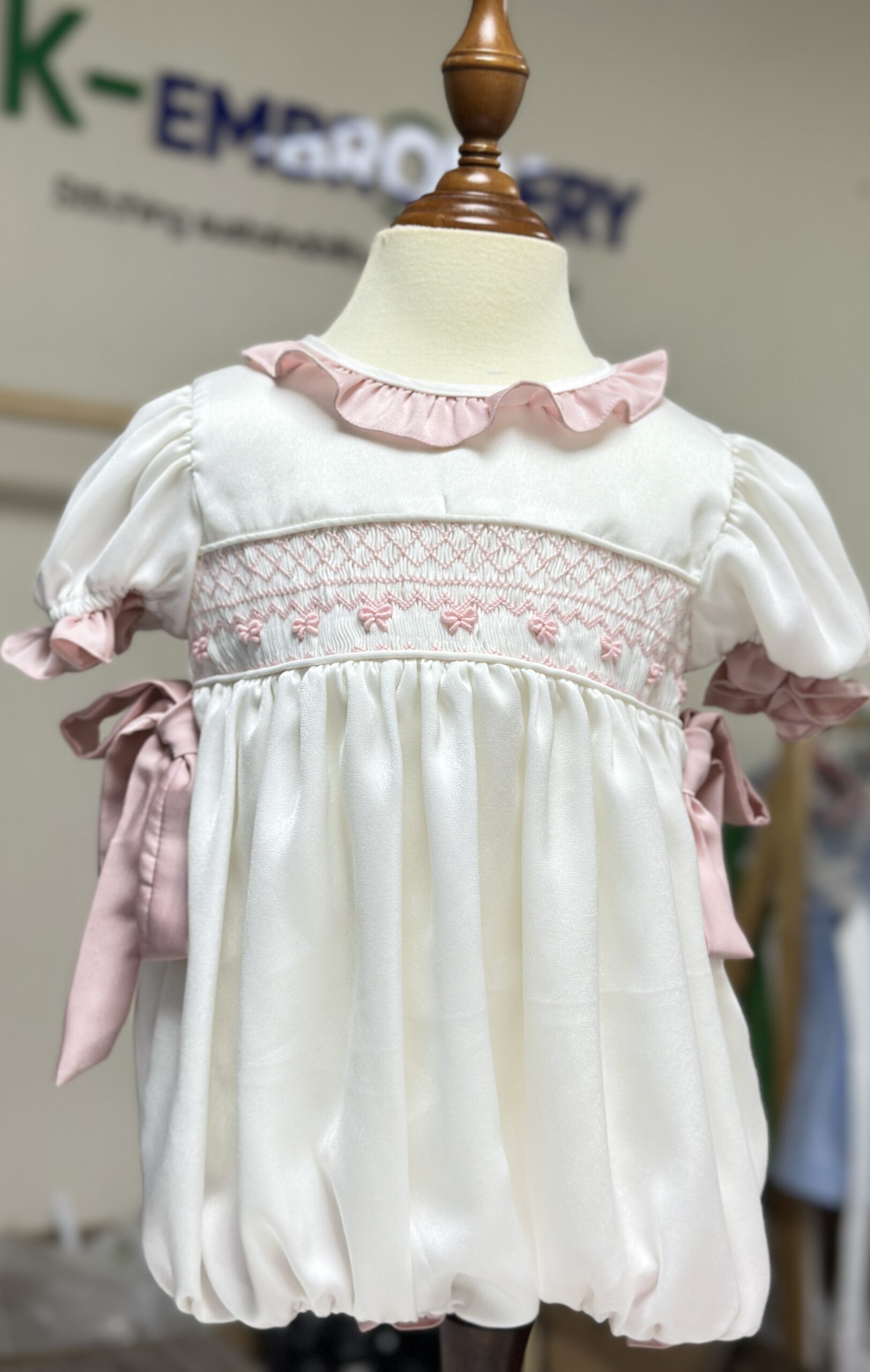 Classic Hand Smocked Baby Girl Romper with Pink Bows