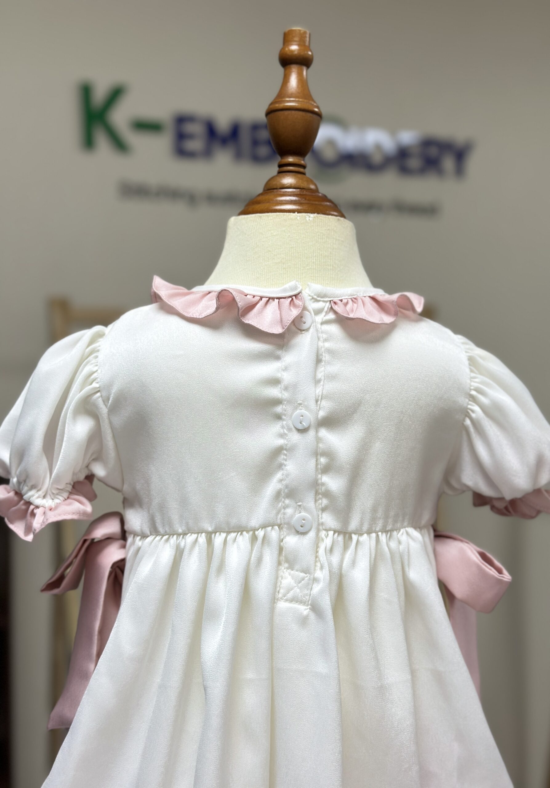 Classic Hand Smocked Baby Girl Romper with Pink Bows