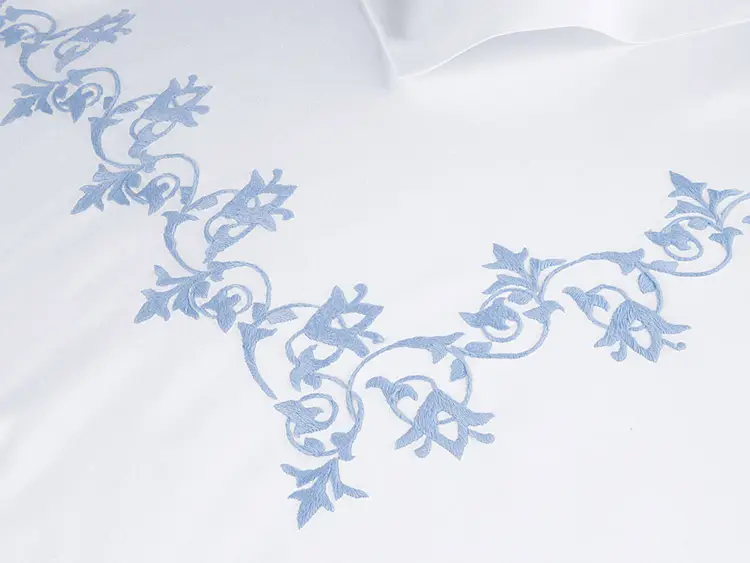 Machine embroidered vine pattern bed sheet