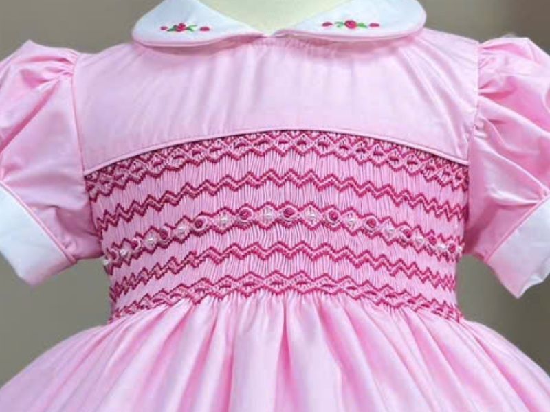 Authentic hand-smocked children's dress by K-Embroidery Vietnam Artisans